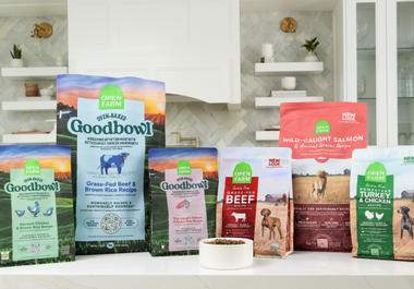 Bags of Open Farm Dog Food on a kitchen counter